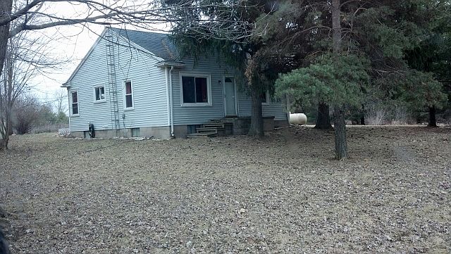 Front and west side of house