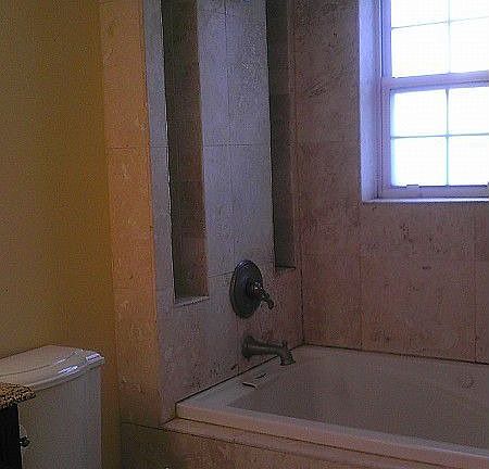 Fantastic whirlpool tub and invigorating rain shower.