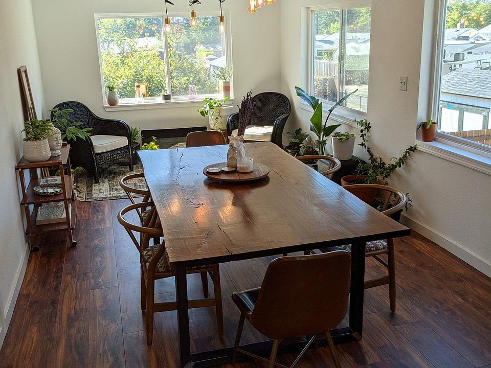 Remodeled sunroom with tons of natural light right off the kitchen. The entire house is freshly painted!