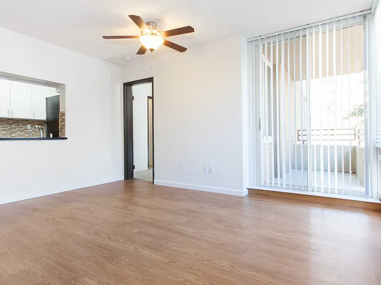 Living Room with Hard Surface Flooring and Balcony