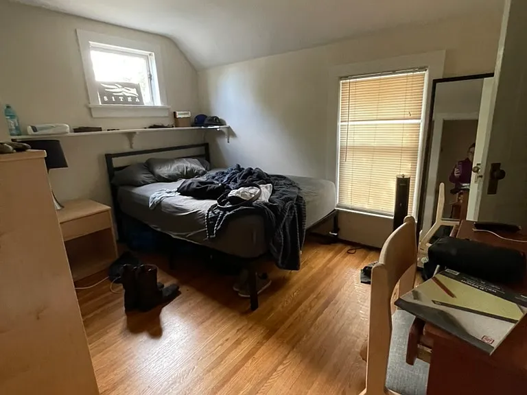 Bedroom 3: Our NEW furniture; photo shows student belongings.