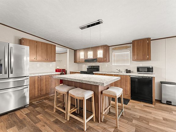 3rd image of 2100 Dove Loop Rd Lot 34