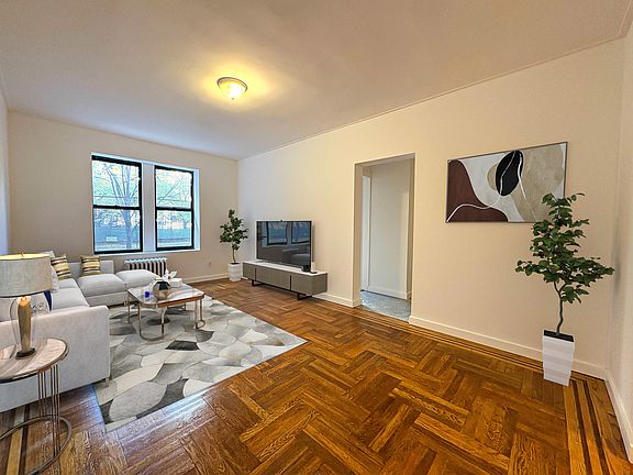 3rd image of 99 E 4th St APT 1J