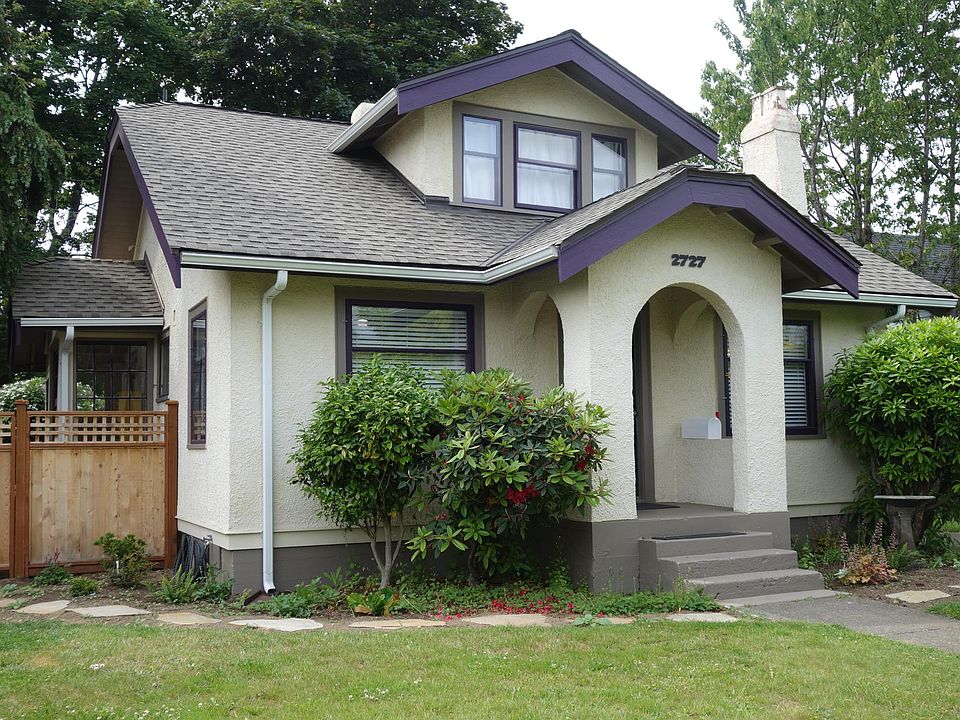 Street view showing path and fence to back yard