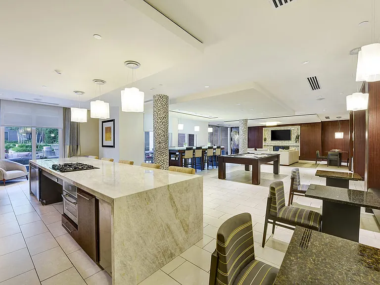 Entertain guests in our lovely club suite with our chefs kitchen