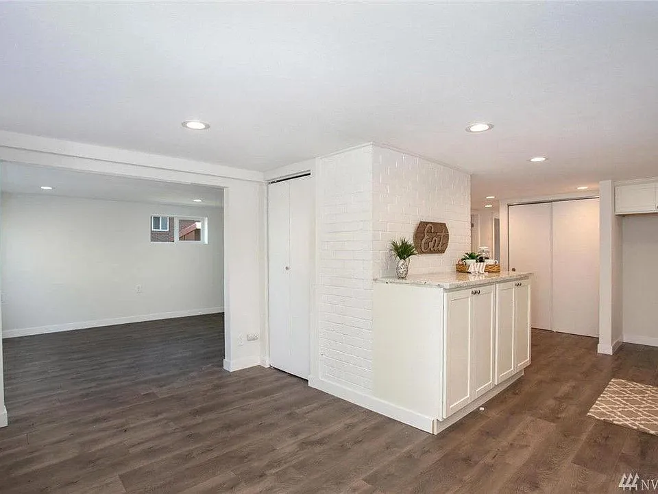 Dining area with view of kitchen and living.
