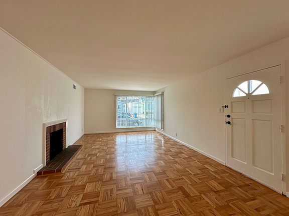 Living Room with Decorative Fireplace