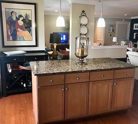Large Granite Island with cabinets for storage