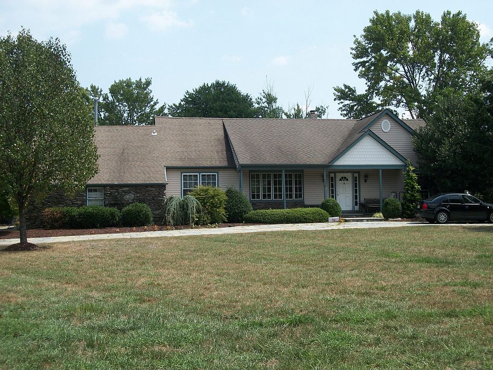 Cape Cod Style Home on 9.66+/- Acres