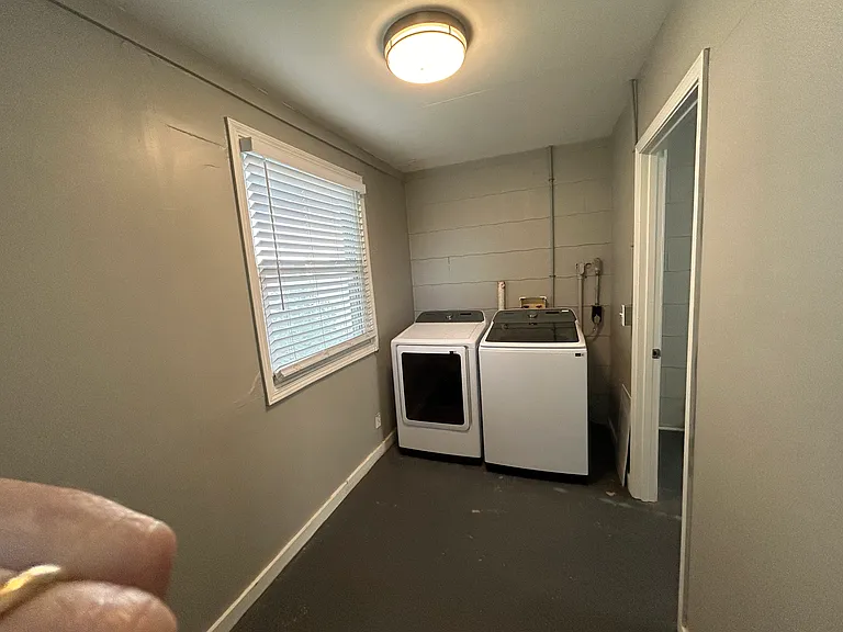 Big laundry room with almost-new machines, and LOTS of storage area