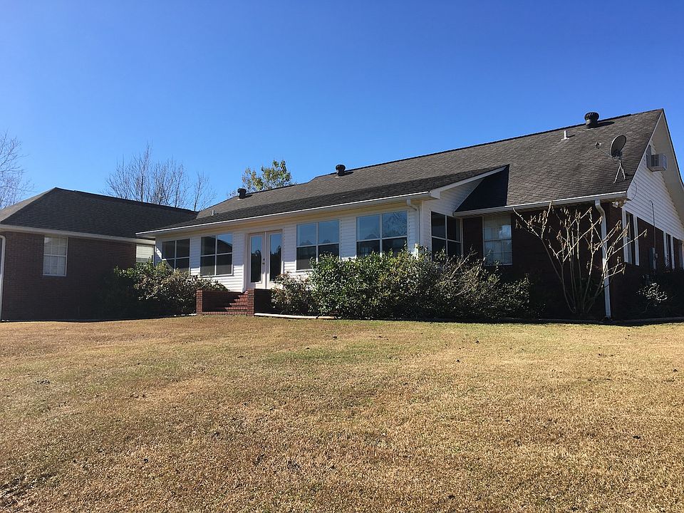 Back lawn overlooking pond