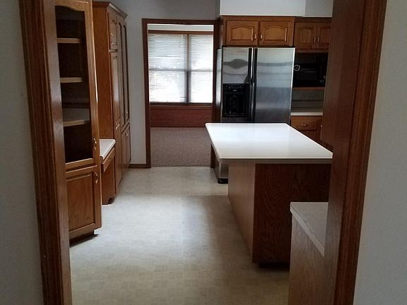Kitchen w view into Dining Room