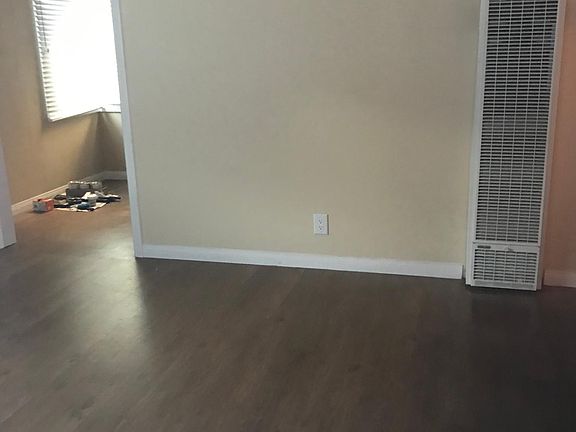 Living Room with wall heater