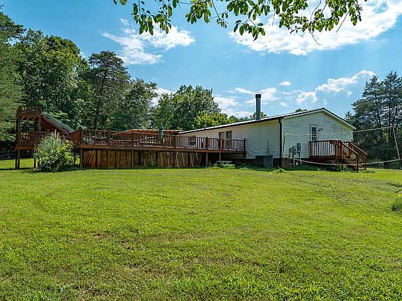 Deck has above ground pool. 