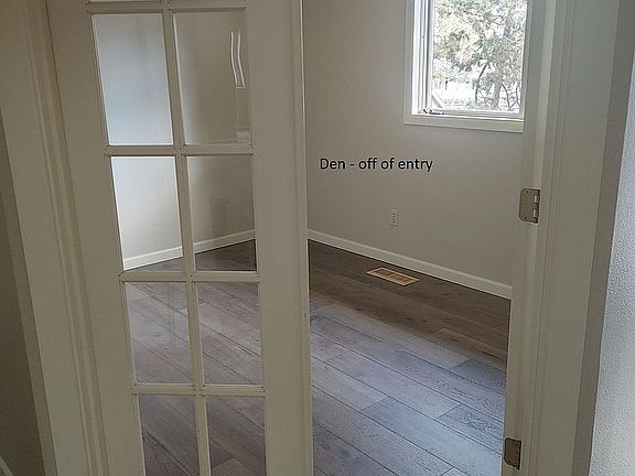 Den off of the entry. Could also be used as an additional smaller office or toy room, etc.