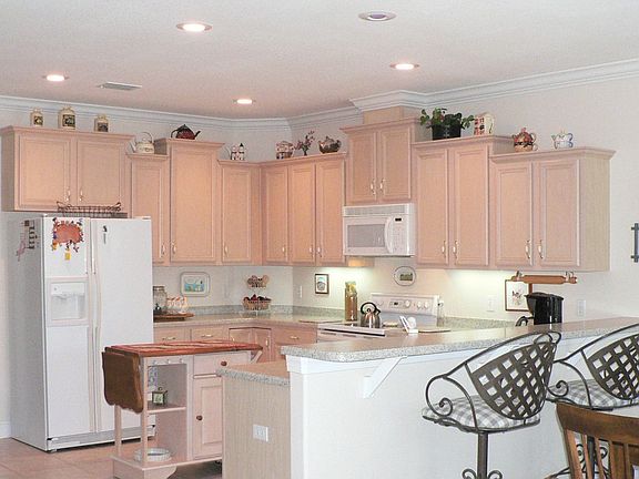 Open Kitchen overlooking water and family room