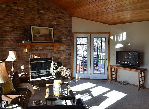 Main floor family room with doors to deck