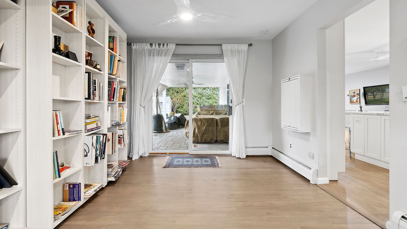  Murphy Bed and section of living room.