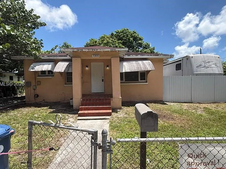 7305 NW 17th Ct — Photo 1