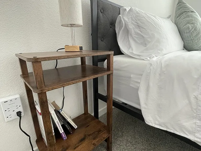 Sleep well with our 3 way dimmable touch lamp with a USB charging port. Books are included for your stay.