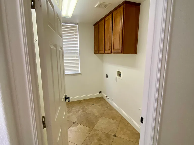Downstairs laundry room with electric and gas hookups. Washer/Dryer provided if needed.