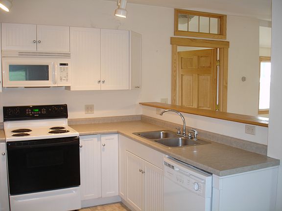 Note dishwasher at right of double sink