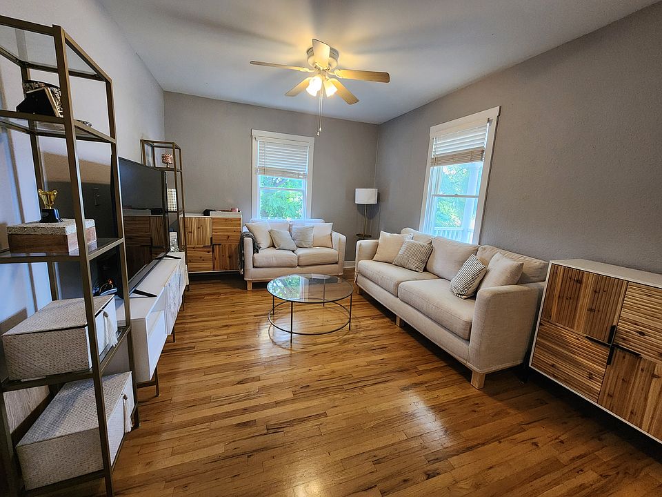 Light n airy living room with beautiful refinished hardwood floors and huge living room.