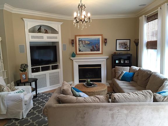 Cozy Living Room with fireplace and built-in