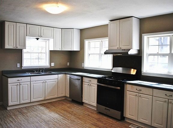 Renovated kitchen with new paint, flooring & appliances