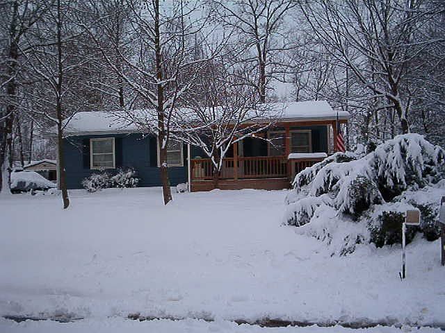 Front of home in snow