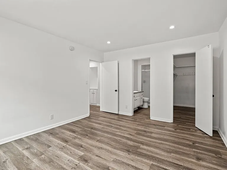 Bedroom with Bathroom and Walk-In Closet
