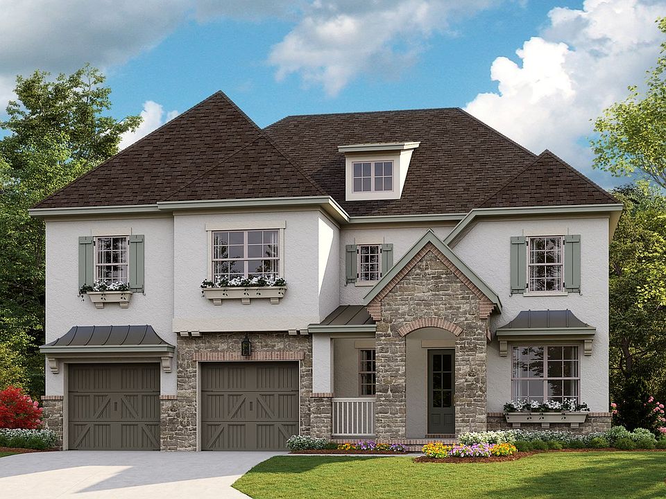 Tiburon C - French Cottage 3-Car Tandem Front Load Garage Note Renderings may show optional fea