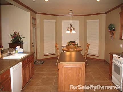 Kitchen island facing Breakfast nook