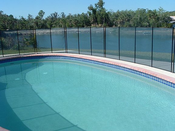 INGROUND POOL /SPRING FED /STOCKED LAKE on 2.5 ACRES !