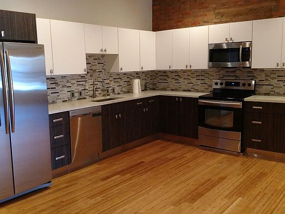 Kitchen featuring high-end stainless steel Samsung appliance