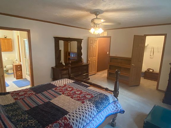 Large master bedroom with walk in closet and bathroom