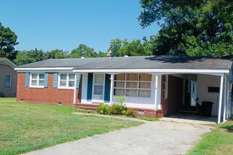 Welcome home! 3 bedroom - 1.5 beauty with a fenced in yard, front porch; carport, and storage. Still finishing renovations**