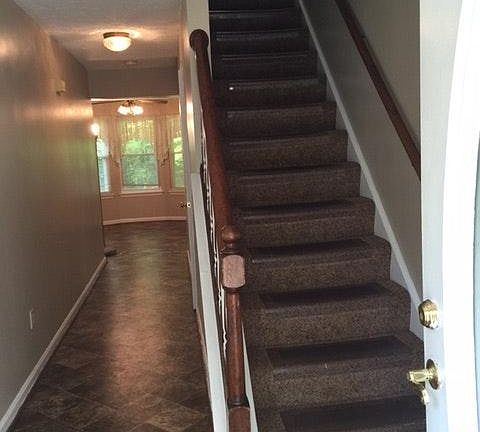 Center hallway with stairs to 2nd floor.