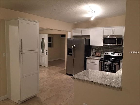 Kitchen and front entrance area