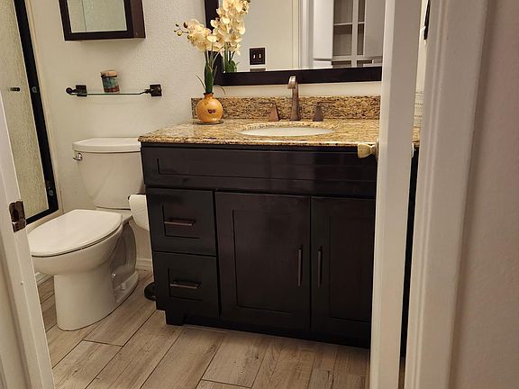 Bathroom next to walk in closet