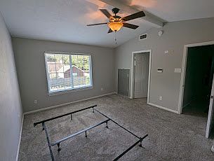 Master Bedroom showing adjustable bedframe set for a king size bed with plenty of additional room for furniture