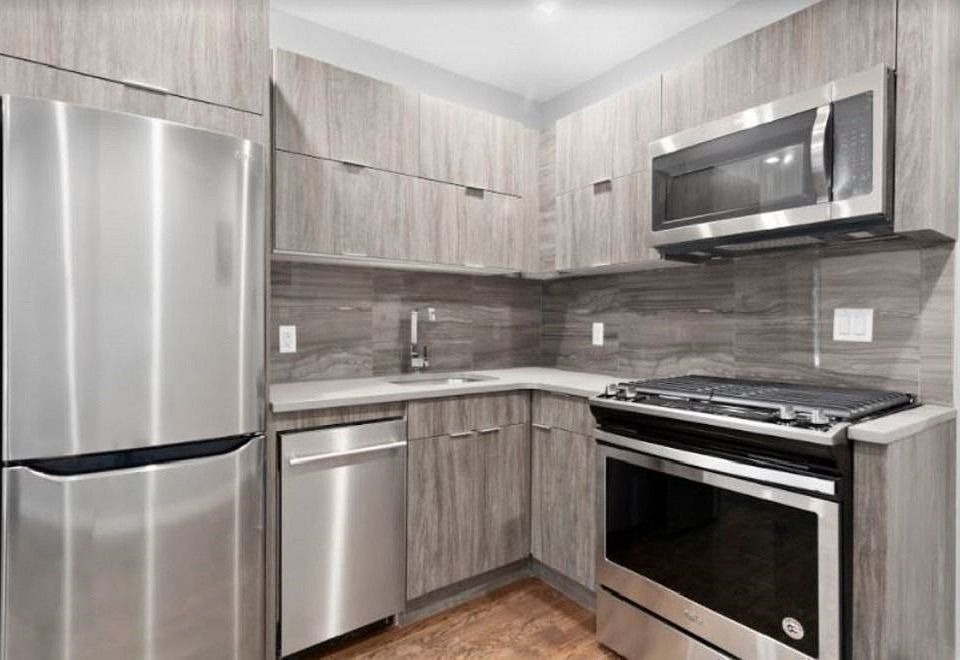 1st image of 411 E 118th St APT 39