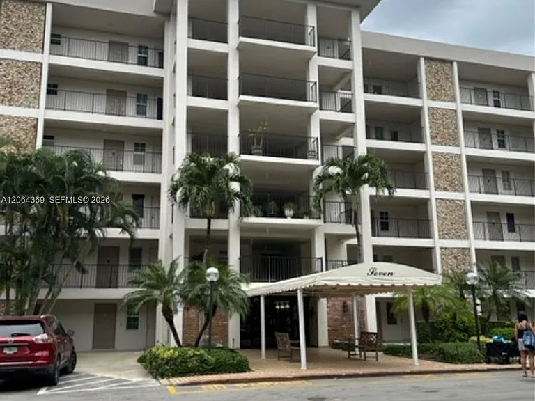 2801 N Palm Aire Dr #607 — Photo 1