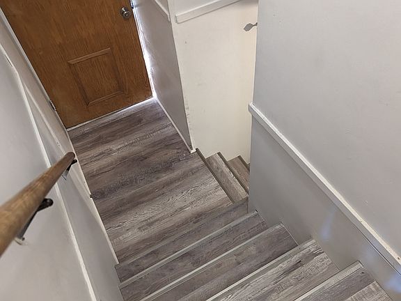 Your entrance, as seen from the door, from my house, leading down (this is how I access the shared laundry).