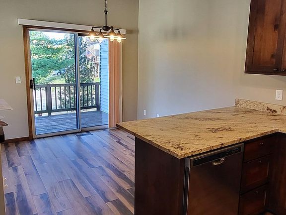 Kitchen/dining area walks out to a private deck.