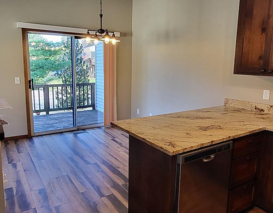 Kitchen/dining area walks out to a private deck.