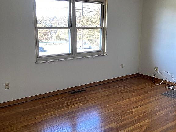 Cozy living room with lot of natural light overlooking Scioto River!