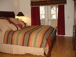 Large masterwith french doors to one of two private patios