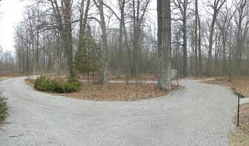 The circular driveway in front of the house offers convenience and plenty of room for parking!