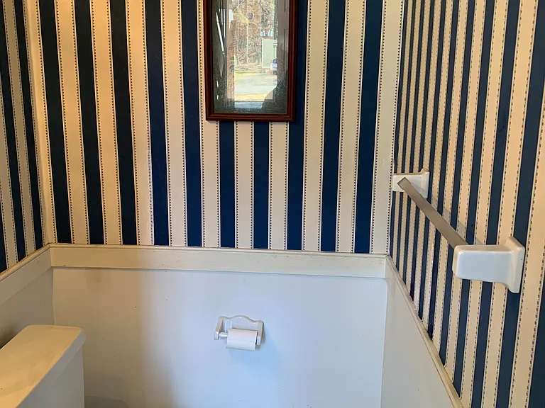 down half-bath off living room
